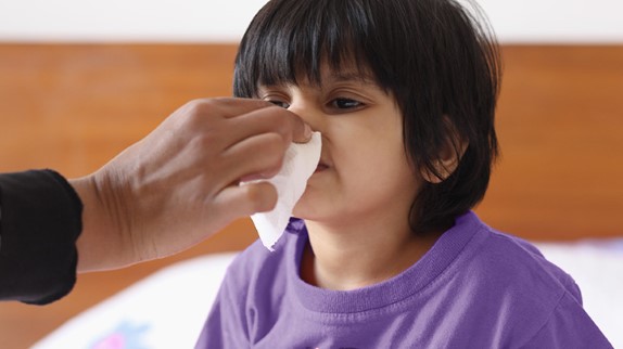 sick toddler blowing his nose, toddler colds